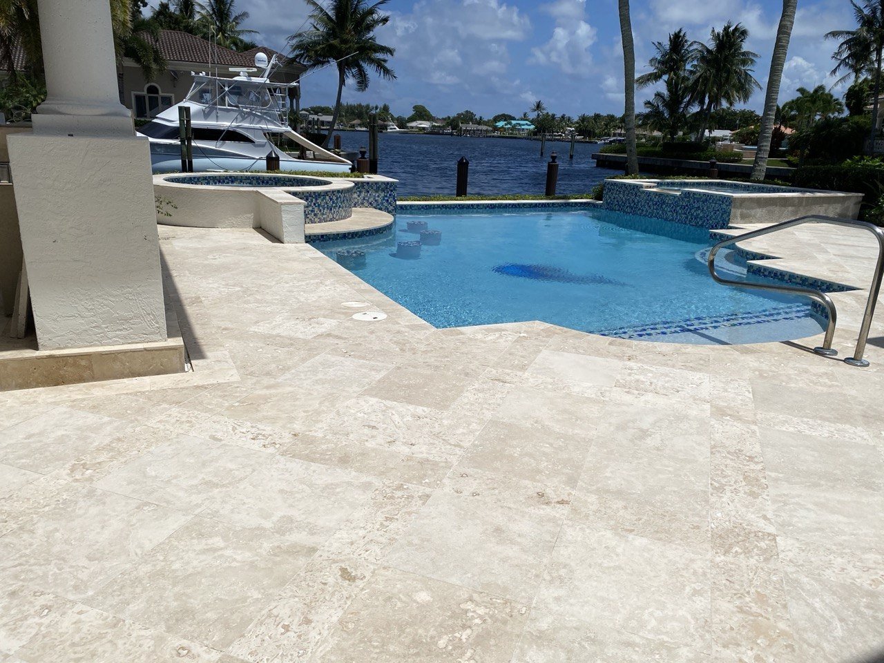 Travertine pool deck restoration before after Palm Beach County